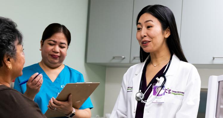 Elder Woman with Doctor in Revision