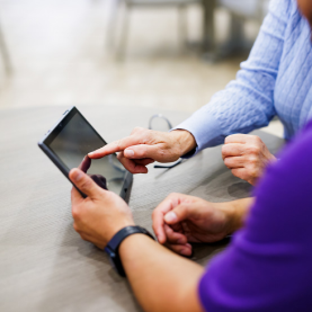 Elderly Patient Using a Tablet