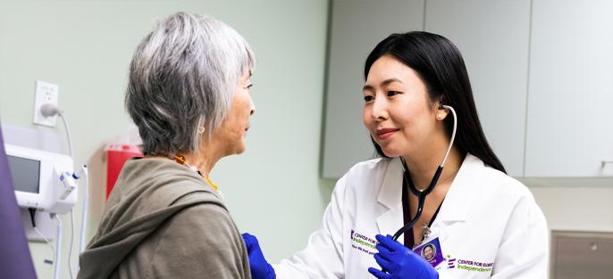 Doctor at Clinic Checking Patient